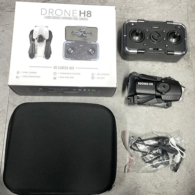 H8 Drone with brushless motor, optical flow, obstacle avoidance, remote control, and battery. Ideal outdoor flying toy gift